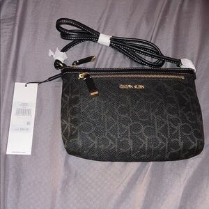 Calvin Klein Black and Gold Monogram Clutch